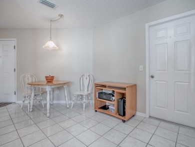 Welcome to your dream home, where comfort meets an active on The Links of Spruce Creek in Florida - for sale on GolfHomes.com, golf home, golf lot