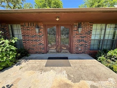 Welcome to 50 Fairway Drive, located inside Falconhead Resort in on Falconhead Resort and Country Club in Oklahoma - for sale on GolfHomes.com, golf home, golf lot