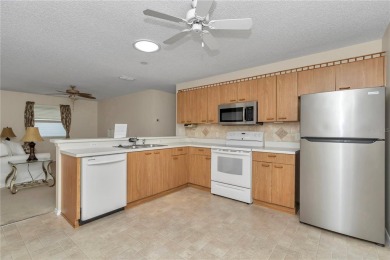 Welcome to this charming 2-bedroom, 2-bathroom home located in on The Links of Spruce Creek in Florida - for sale on GolfHomes.com, golf home, golf lot