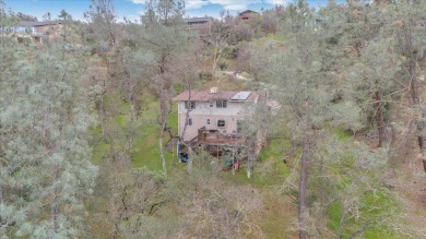 Nestled just around the bend from Lake Tulloch, this charming on The Club at Copper Valley Golf Course in California - for sale on GolfHomes.com, golf home, golf lot