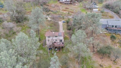 Nestled just around the bend from Lake Tulloch, this charming on The Club at Copper Valley Golf Course in California - for sale on GolfHomes.com, golf home, golf lot