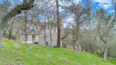 Nestled just around the bend from Lake Tulloch, this charming on The Club at Copper Valley Golf Course in California - for sale on GolfHomes.com, golf home, golf lot