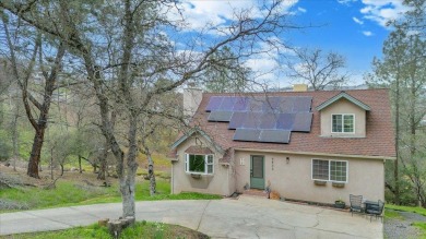 Nestled just around the bend from Lake Tulloch, this charming on The Club at Copper Valley Golf Course in California - for sale on GolfHomes.com, golf home, golf lot