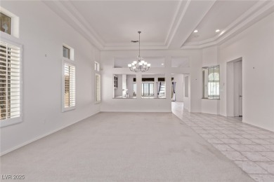 Step through 10-foot entry doors into vaulted ceilings  enjoy on Highland Falls Golf Club in Nevada - for sale on GolfHomes.com, golf home, golf lot