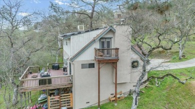 Nestled just around the bend from Lake Tulloch, this charming on The Club at Copper Valley Golf Course in California - for sale on GolfHomes.com, golf home, golf lot