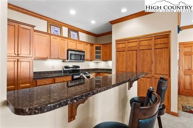 Beautiful condo located at The Reserve at Sugar Mountain with on Sugar Mountain Golf Course in North Carolina - for sale on GolfHomes.com, golf home, golf lot