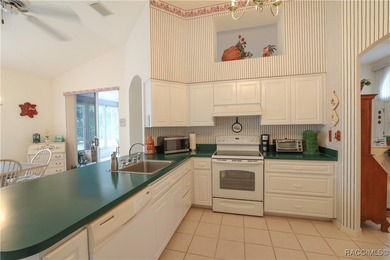 Welcome to this immaculately cared-for 3-bedroom, 2-bath home on Twisted Oaks Golf Club in Florida - for sale on GolfHomes.com, golf home, golf lot