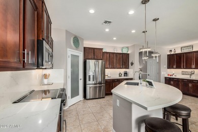 Gorgeous home offering style, comfort, and stunning golf course on Copper Canyon Golf Club in Arizona - for sale on GolfHomes.com, golf home, golf lot