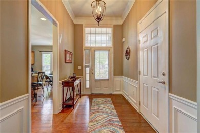 Experience this beautifully updated ranch-style home within an on Canongate Golf At Sun City Peachtree in Georgia - for sale on GolfHomes.com, golf home, golf lot