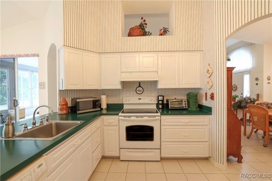 Welcome to this immaculately cared-for 3-bedroom, 2-bath home on Twisted Oaks Golf Club in Florida - for sale on GolfHomes.com, golf home, golf lot