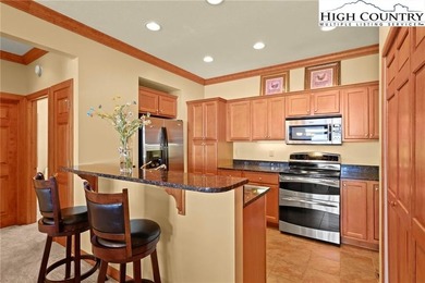 Beautiful condo located at The Reserve at Sugar Mountain with on Sugar Mountain Golf Course in North Carolina - for sale on GolfHomes.com, golf home, golf lot