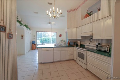 Welcome to this immaculately cared-for 3-bedroom, 2-bath home on Twisted Oaks Golf Club in Florida - for sale on GolfHomes.com, golf home, golf lot