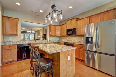 Experience this beautifully updated ranch-style home within an on Canongate Golf At Sun City Peachtree in Georgia - for sale on GolfHomes.com, golf home, golf lot