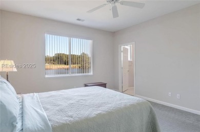 Rare Dickinson model features a delightful 2-bedroom, 2-bathroom on Okatie Creek Golf Club in South Carolina - for sale on GolfHomes.com, golf home, golf lot
