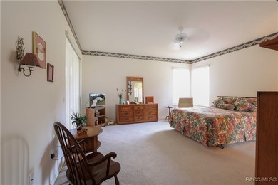 Welcome to this immaculately cared-for 3-bedroom, 2-bath home on Twisted Oaks Golf Club in Florida - for sale on GolfHomes.com, golf home, golf lot