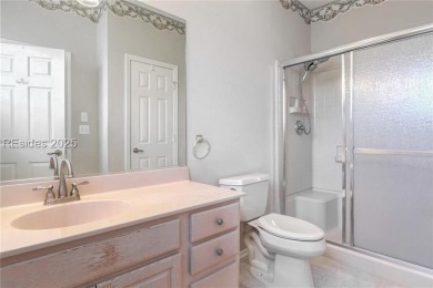 Rare Dickinson model features a delightful 2-bedroom, 2-bathroom on Okatie Creek Golf Club in South Carolina - for sale on GolfHomes.com, golf home, golf lot