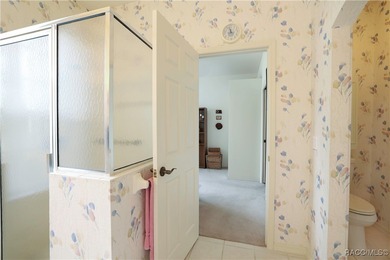 Welcome to this immaculately cared-for 3-bedroom, 2-bath home on Twisted Oaks Golf Club in Florida - for sale on GolfHomes.com, golf home, golf lot