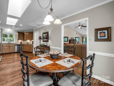 Immaculate golf course home overlooking the 16th fairway of on Rumbling Bald Resort on Lake Lure in North Carolina - for sale on GolfHomes.com, golf home, golf lot