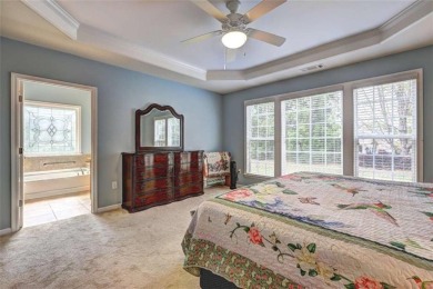 Experience this beautifully updated ranch-style home within an on Canongate Golf At Sun City Peachtree in Georgia - for sale on GolfHomes.com, golf home, golf lot