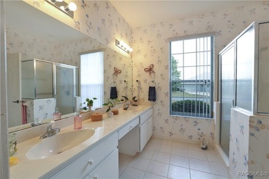 Welcome to this immaculately cared-for 3-bedroom, 2-bath home on Twisted Oaks Golf Club in Florida - for sale on GolfHomes.com, golf home, golf lot