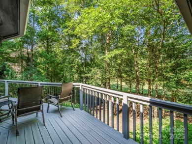 Immaculate golf course home overlooking the 16th fairway of on Rumbling Bald Resort on Lake Lure in North Carolina - for sale on GolfHomes.com, golf home, golf lot