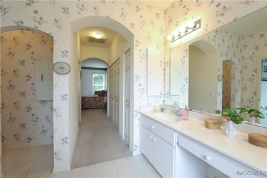 Welcome to this immaculately cared-for 3-bedroom, 2-bath home on Twisted Oaks Golf Club in Florida - for sale on GolfHomes.com, golf home, golf lot