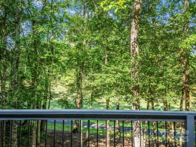 Immaculate golf course home overlooking the 16th fairway of on Rumbling Bald Resort on Lake Lure in North Carolina - for sale on GolfHomes.com, golf home, golf lot