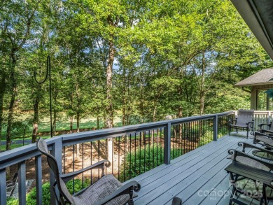 Immaculate golf course home overlooking the 16th fairway of on Rumbling Bald Resort on Lake Lure in North Carolina - for sale on GolfHomes.com, golf home, golf lot