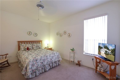 Welcome to this immaculately cared-for 3-bedroom, 2-bath home on Twisted Oaks Golf Club in Florida - for sale on GolfHomes.com, golf home, golf lot