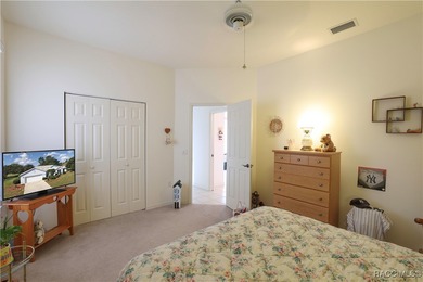 Welcome to this immaculately cared-for 3-bedroom, 2-bath home on Twisted Oaks Golf Club in Florida - for sale on GolfHomes.com, golf home, golf lot