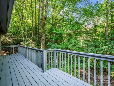 Immaculate golf course home overlooking the 16th fairway of on Rumbling Bald Resort on Lake Lure in North Carolina - for sale on GolfHomes.com, golf home, golf lot