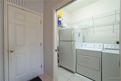 Welcome to this immaculately cared-for 3-bedroom, 2-bath home on Twisted Oaks Golf Club in Florida - for sale on GolfHomes.com, golf home, golf lot