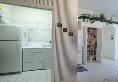 Welcome to this immaculately cared-for 3-bedroom, 2-bath home on Twisted Oaks Golf Club in Florida - for sale on GolfHomes.com, golf home, golf lot