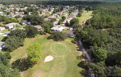 Welcome to this immaculately cared-for 3-bedroom, 2-bath home on Twisted Oaks Golf Club in Florida - for sale on GolfHomes.com, golf home, golf lot