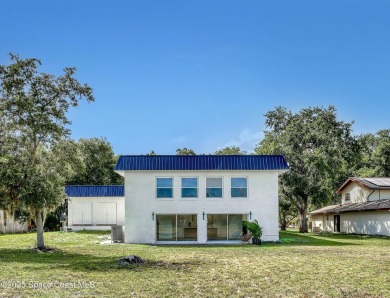 One-of-a-kind modern home in Titusville! This fully renovated on Sherwood Golf Club in Florida - for sale on GolfHomes.com, golf home, golf lot
