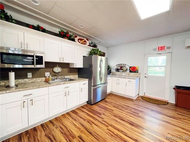 Welcome to this immaculately cared-for 3-bedroom, 2-bath home on Twisted Oaks Golf Club in Florida - for sale on GolfHomes.com, golf home, golf lot