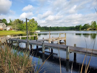 Beautiful corner lot overlooking the 11th hole of the Wyboo Golf on Players Course At Wyboo Plantation in South Carolina - for sale on GolfHomes.com, golf home, golf lot
