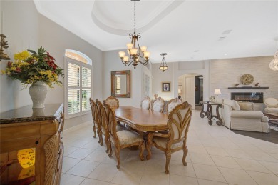 Luxury, comfort and views converge!  This captivating LAKEFRONT on Calusa Lakes Golf Club in Florida - for sale on GolfHomes.com, golf home, golf lot
