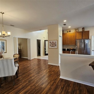Enter this cozy home that offers the perfect space for a single on Lake Ashton Golf Club in Florida - for sale on GolfHomes.com, golf home, golf lot