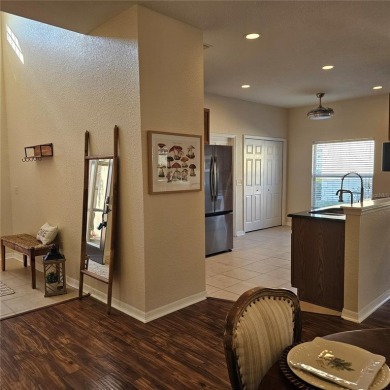 Enter this cozy home that offers the perfect space for a single on Lake Ashton Golf Club in Florida - for sale on GolfHomes.com, golf home, golf lot