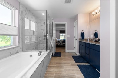Like new and move-in ready, this exceptional 4-bedroom, 2.5-bath on Timber Trace Golf Club in Michigan - for sale on GolfHomes.com, golf home, golf lot