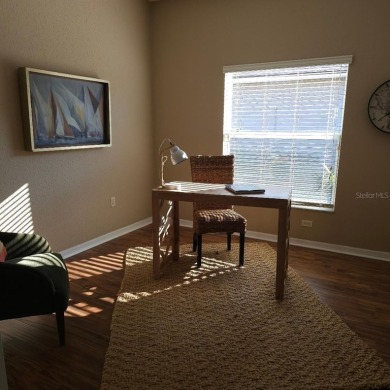 Enter this cozy home that offers the perfect space for a single on Lake Ashton Golf Club in Florida - for sale on GolfHomes.com, golf home, golf lot