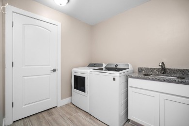 Like new and move-in ready, this exceptional 4-bedroom, 2.5-bath on Timber Trace Golf Club in Michigan - for sale on GolfHomes.com, golf home, golf lot