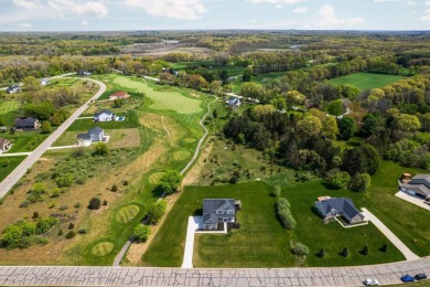 Like new and move-in ready, this exceptional 4-bedroom, 2.5-bath on Timber Trace Golf Club in Michigan - for sale on GolfHomes.com, golf home, golf lot