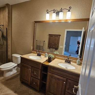 Enter this cozy home that offers the perfect space for a single on Lake Ashton Golf Club in Florida - for sale on GolfHomes.com, golf home, golf lot