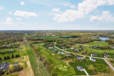 Like new and move-in ready, this exceptional 4-bedroom, 2.5-bath on Timber Trace Golf Club in Michigan - for sale on GolfHomes.com, golf home, golf lot