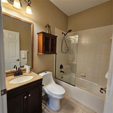Enter this cozy home that offers the perfect space for a single on Lake Ashton Golf Club in Florida - for sale on GolfHomes.com, golf home, golf lot