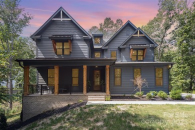 Step into Lake Wylie's finest living with a waterfront home that on The Palisades Country Club in North Carolina - for sale on GolfHomes.com, golf home, golf lot