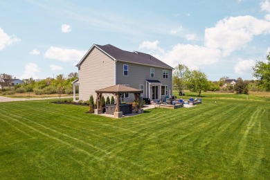 Like new and move-in ready, this exceptional 4-bedroom, 2.5-bath on Timber Trace Golf Club in Michigan - for sale on GolfHomes.com, golf home, golf lot