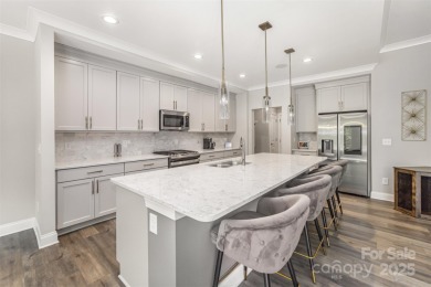Step into Lake Wylie's finest living with a waterfront home that on The Palisades Country Club in North Carolina - for sale on GolfHomes.com, golf home, golf lot